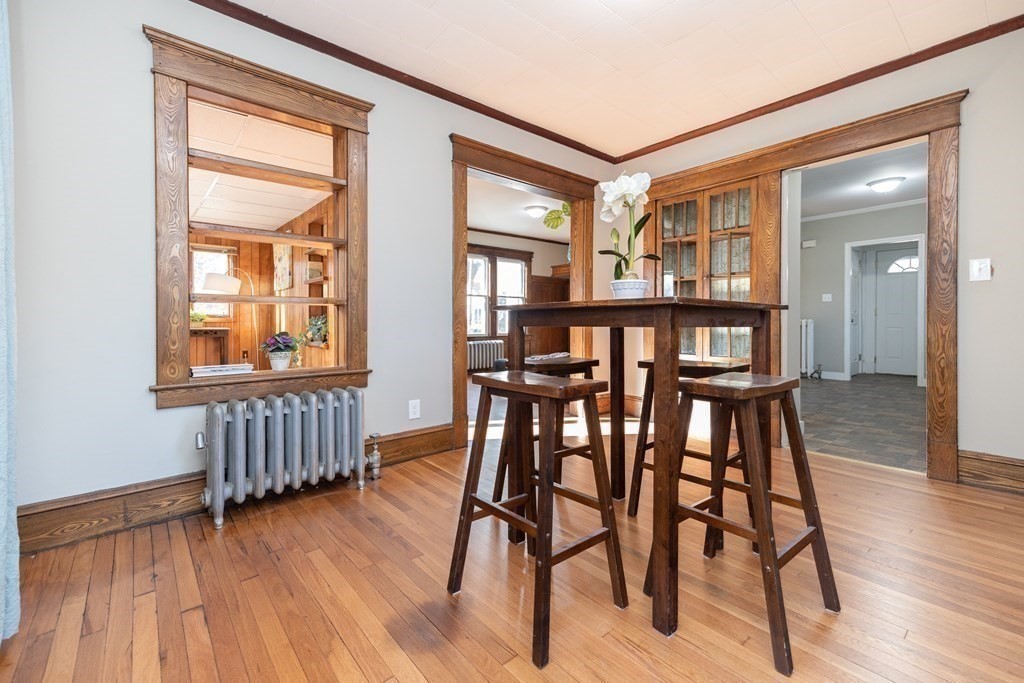 25 Daviston Street Springfield, MA 01108 - Photo 12 of 42 a view of a dining room with furniture window and wooden floor