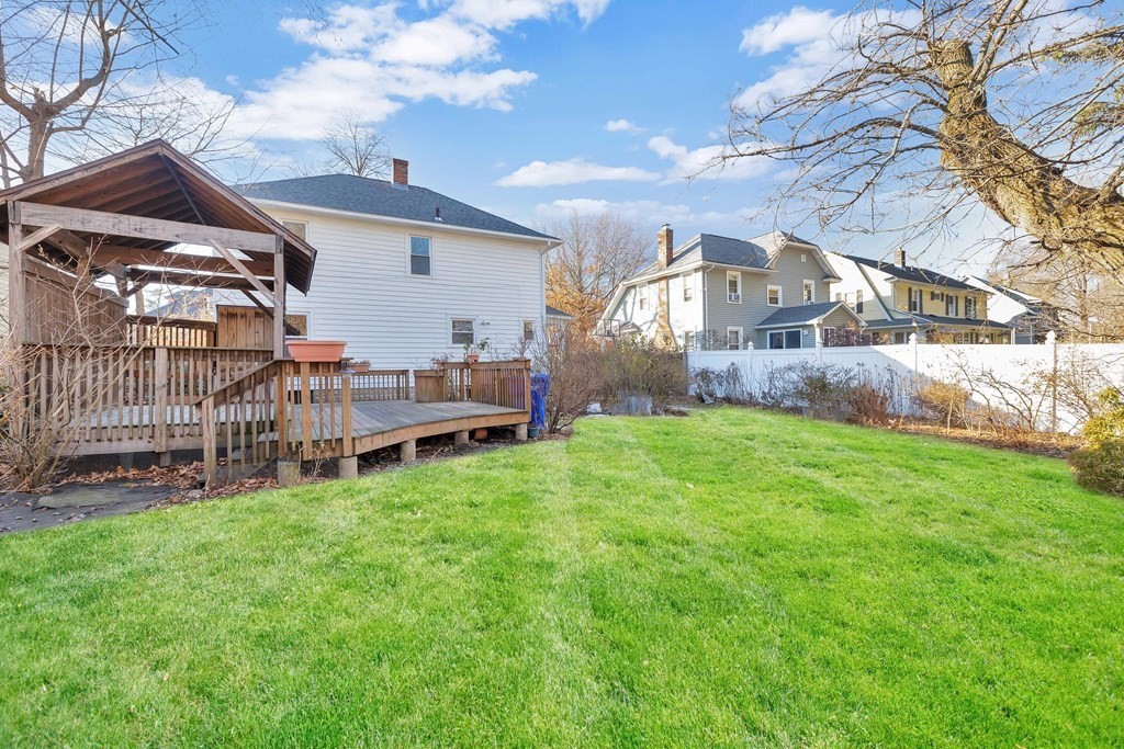 25 Daviston Street Springfield, MA 01108 - Photo 41 of 42 a view of a house with a yard and sitting area