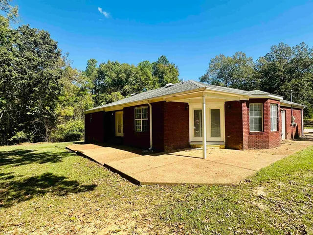 a house with yard in front of it