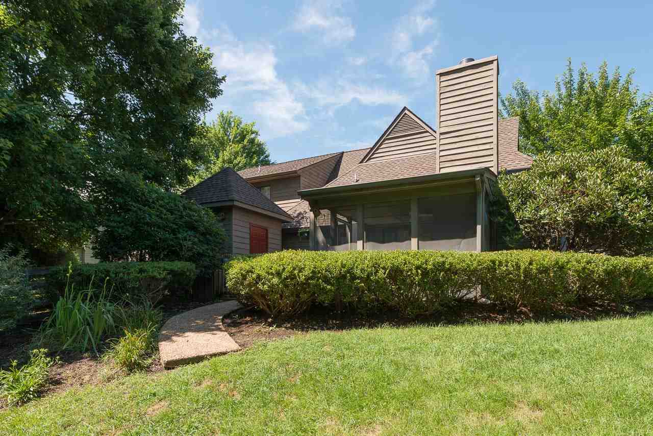 1053 Amber Ridge Road Charlottesville, VA 22901 - Photo 13 of 13 a front view of a house with a garden
