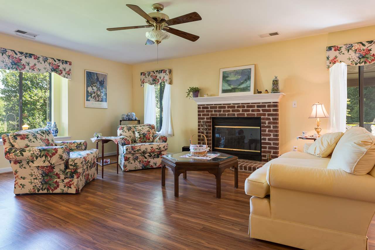 1053 Amber Ridge Road Charlottesville, VA 22901 - Photo 2 of 13 a living room with furniture and a fireplace