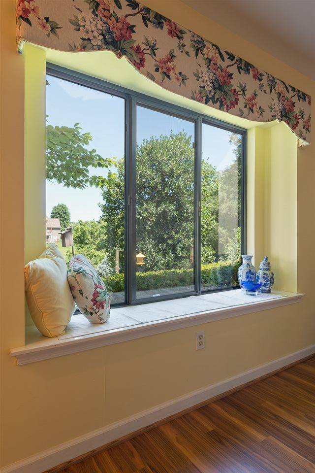 1053 Amber Ridge Road Charlottesville, VA 22901 - Photo 3 of 13 a view of a room that has a large window and front view of a living room
