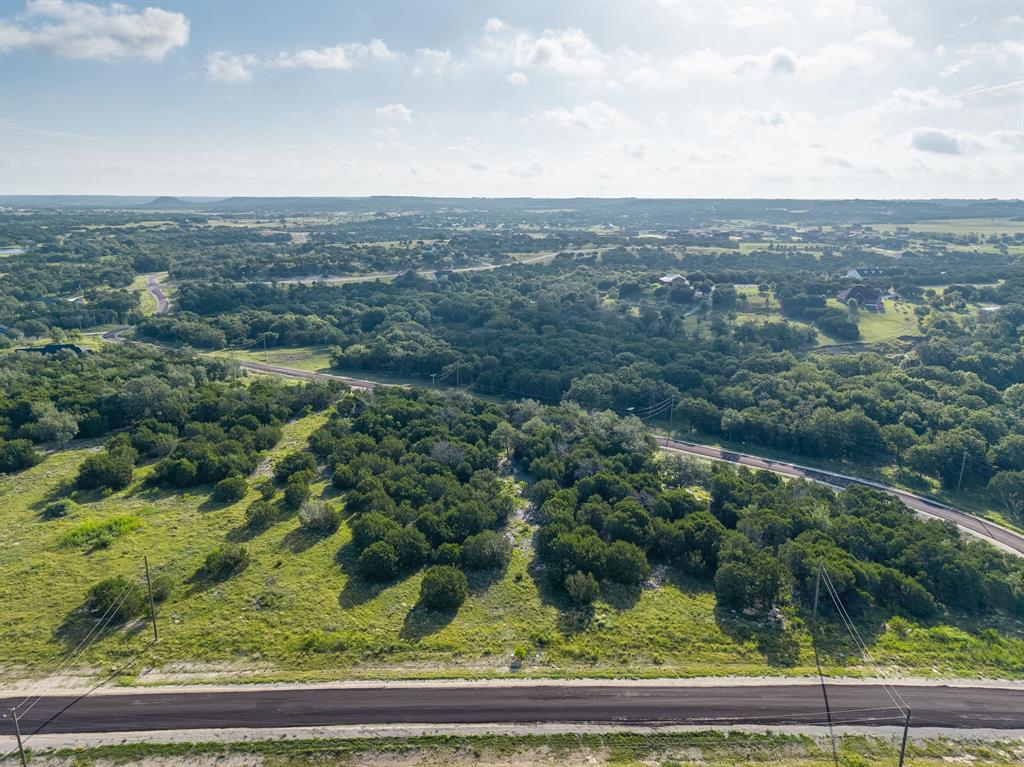 1086-1090 Creek Crossing Road Nemo, TX 76070 - Photo 8 of 13 an aerial view of houses covered in trees