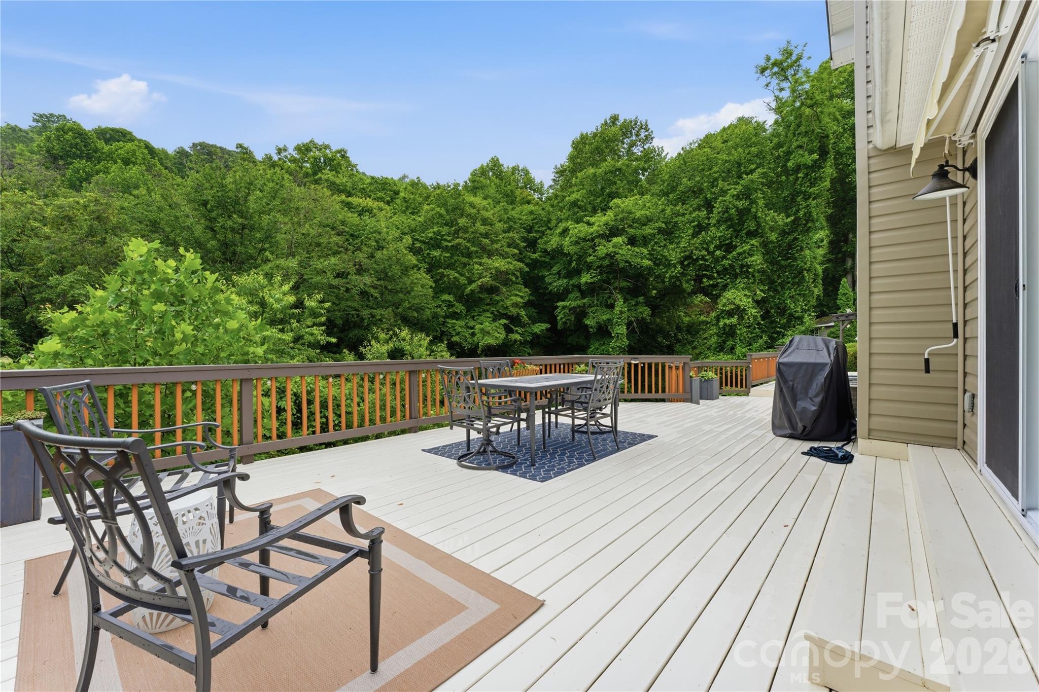 15 Raccoon Point Canton, NC 28716 - Photo 37 of 48 a view of a chairs and tables on the roof deck