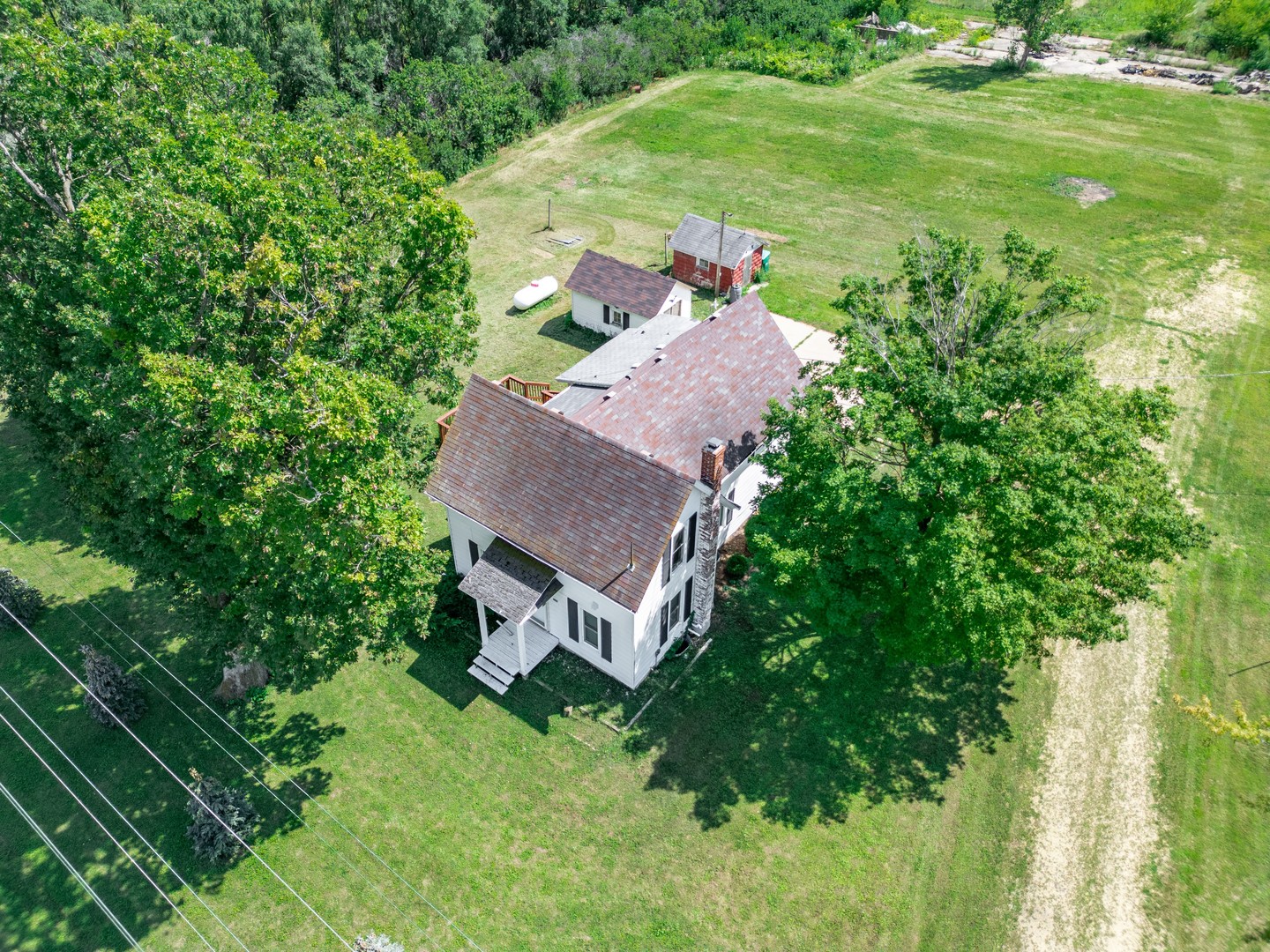 7496 Wolf Road Kingston, IL 60145 - Photo 2 of 38 an aerial view of a house with a yard