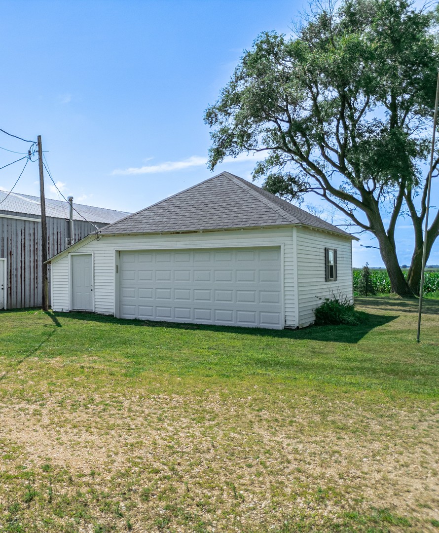 7496 Wolf Road Kingston, IL 60145 - Photo 32 of 38 a house view with a garden space