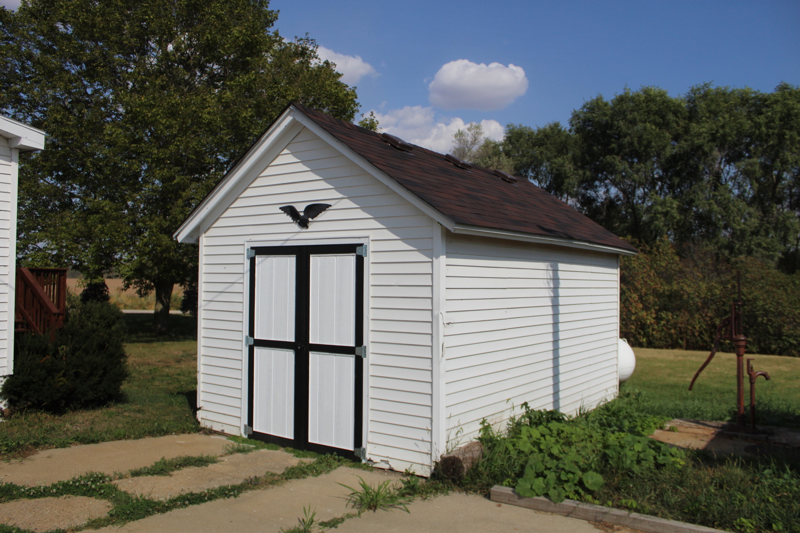 7496 Wolf Road Kingston, IL 60145 - Photo 33 of 38 a front view of a house with garden