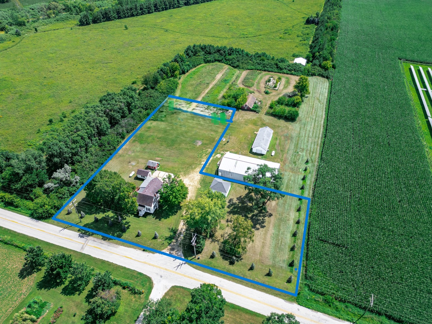 7496 Wolf Road Kingston, IL 60145 - Photo 36 of 38 an aerial view of a house having outdoor space