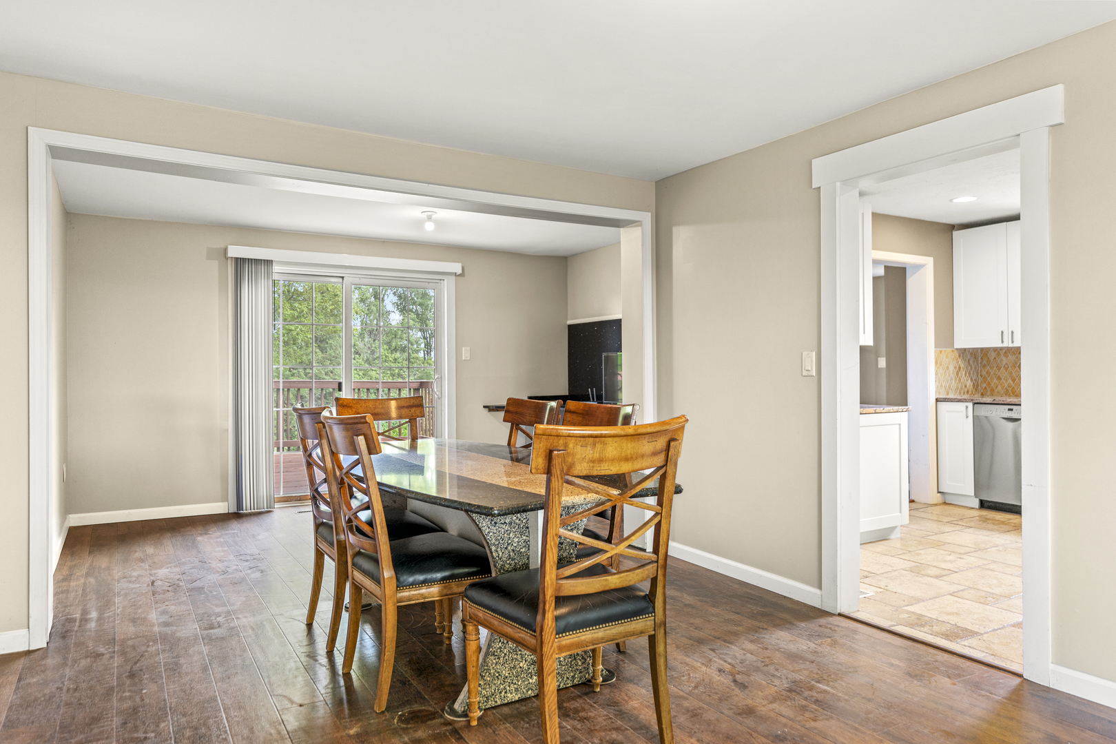 7496 Wolf Road Kingston, IL 60145 - Photo 7 of 38 a view of a dining room with furniture and a window