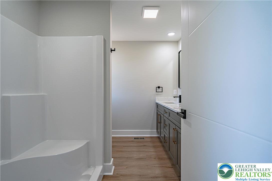 261 Maple Street Coplay, PA 18037 - Photo 27 of 53 a bathroom with a sink and a tub