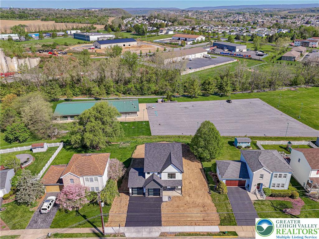 261 Maple Street Coplay, PA 18037 - Photo 4 of 53 an aerial view of a house with a garden