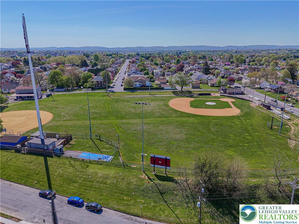 261 Maple Street Coplay, PA 18037 - Photo 49 of 53 an aerial view of a house with a yard