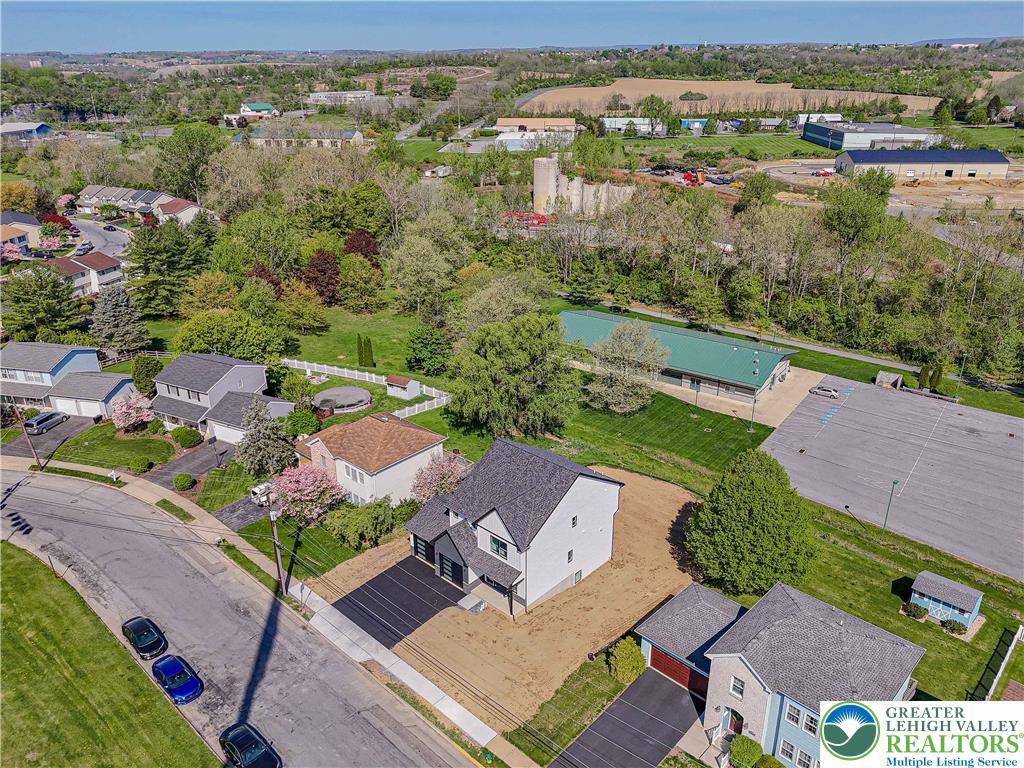 261 Maple Street Coplay, PA 18037 - Photo 6 of 53 an aerial view of a house with a garden