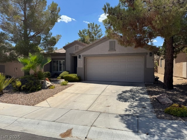 2189 Chapman Ranch Drive Henderson, NV 89012 - Photo 1 of 2 A well-kept front yard offers low-maintenance landscaping and an inviting entryway to this charming residence.