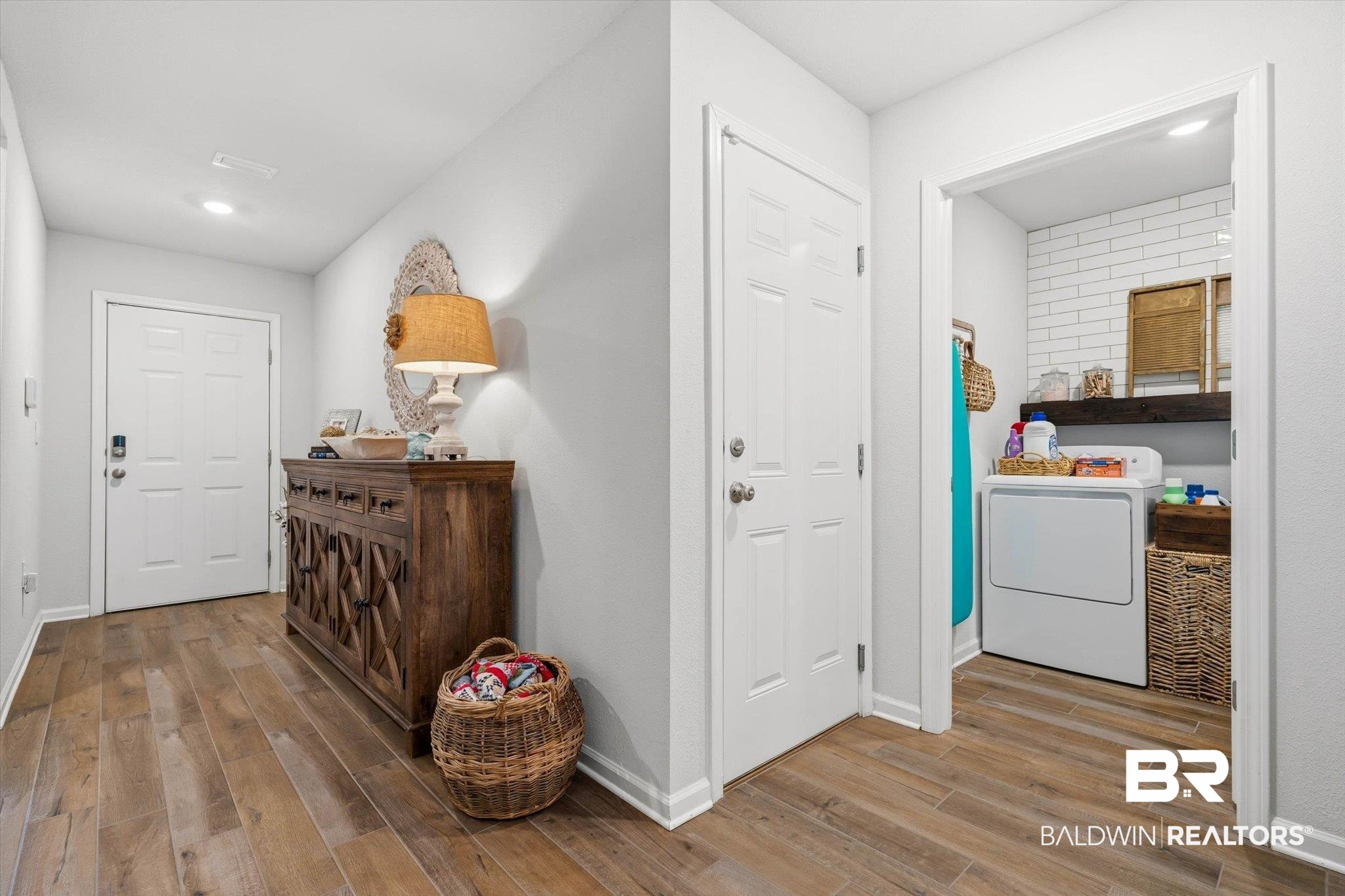 17041 Muse Street Loxley, AL 36551 - Photo 18 of 44 Laundry room featuring washer / dryer, light wood-style floors, and recessed lighting