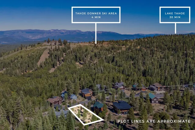 a view of a city with mountains in the background