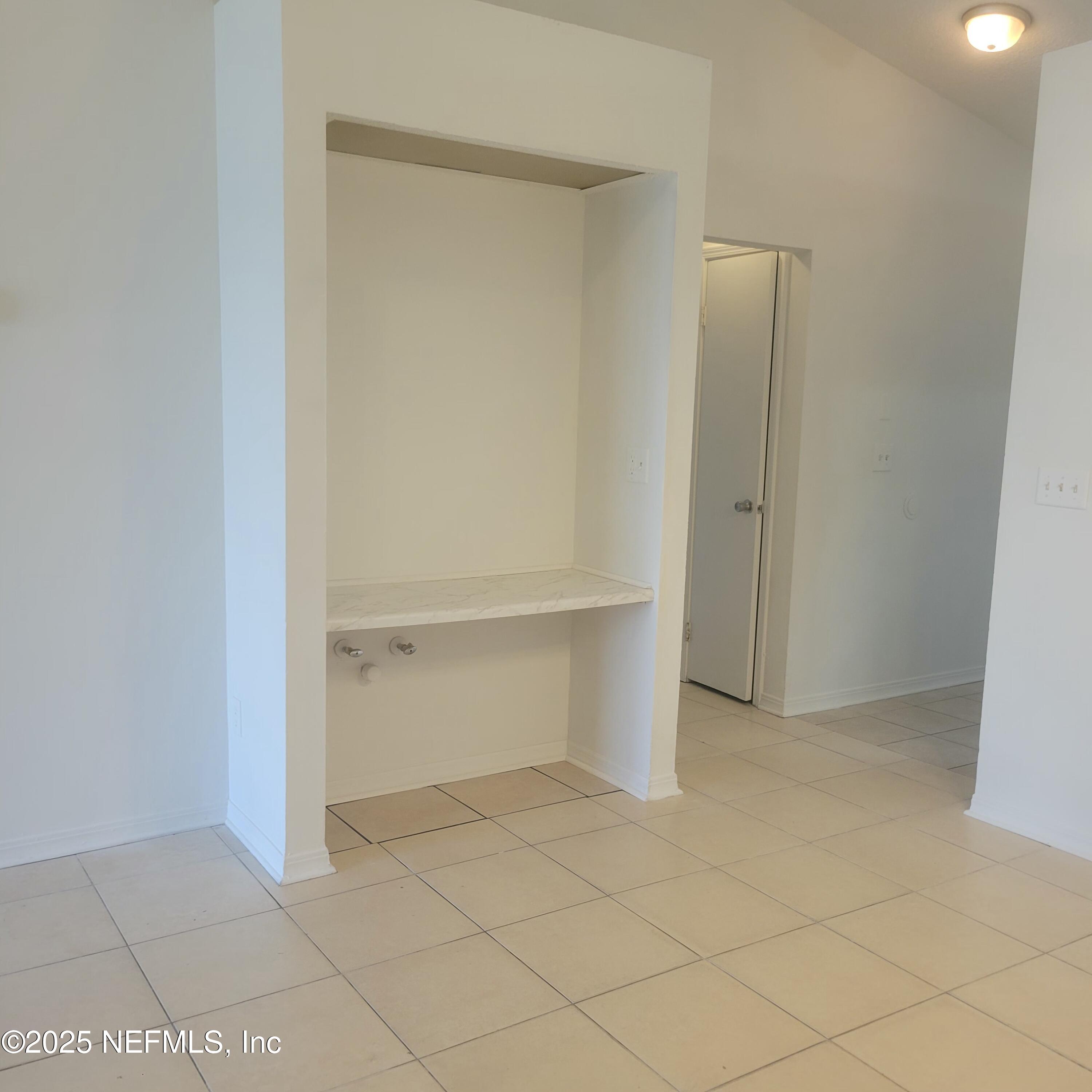 5138 Ricker Road, Unit 2 Jacksonville, FL 32210 - Photo 12 of 17 an empty room with closet