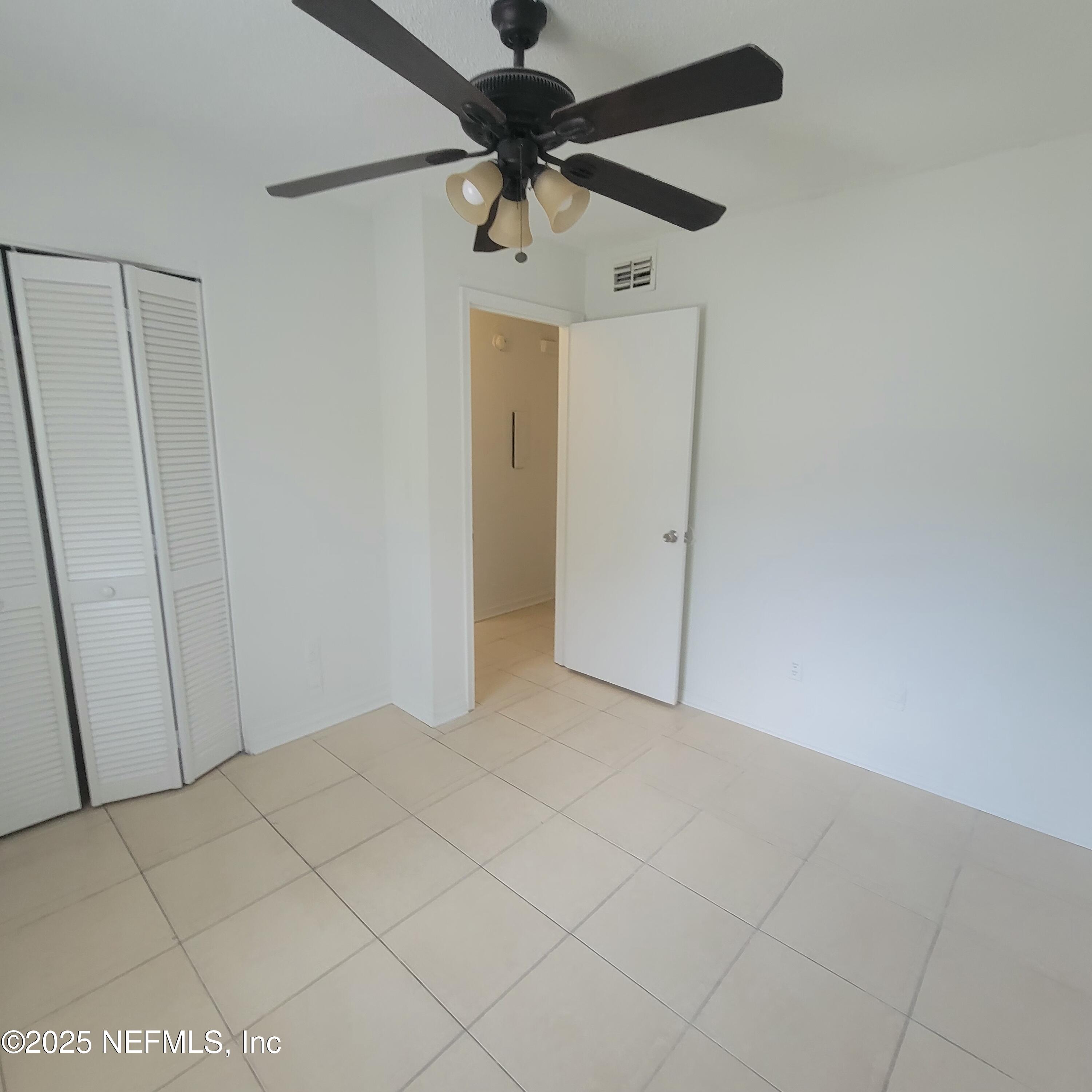5138 Ricker Road, Unit 2 Jacksonville, FL 32210 - Photo 5 of 17 a view of an empty room