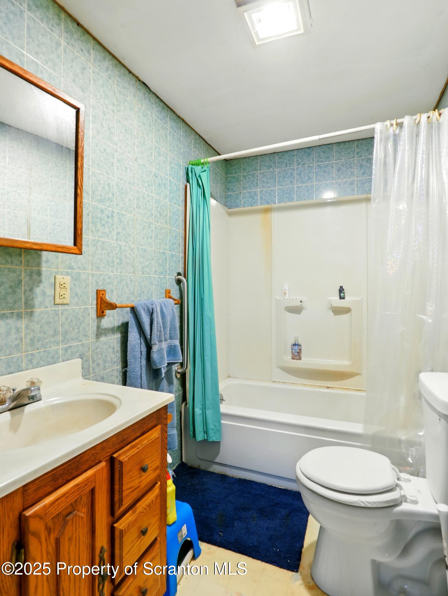 110 Bluegrass Road Tunkhannock, PA 18657 - Photo 13 of 17 a bathroom with a sink a toilet and shower