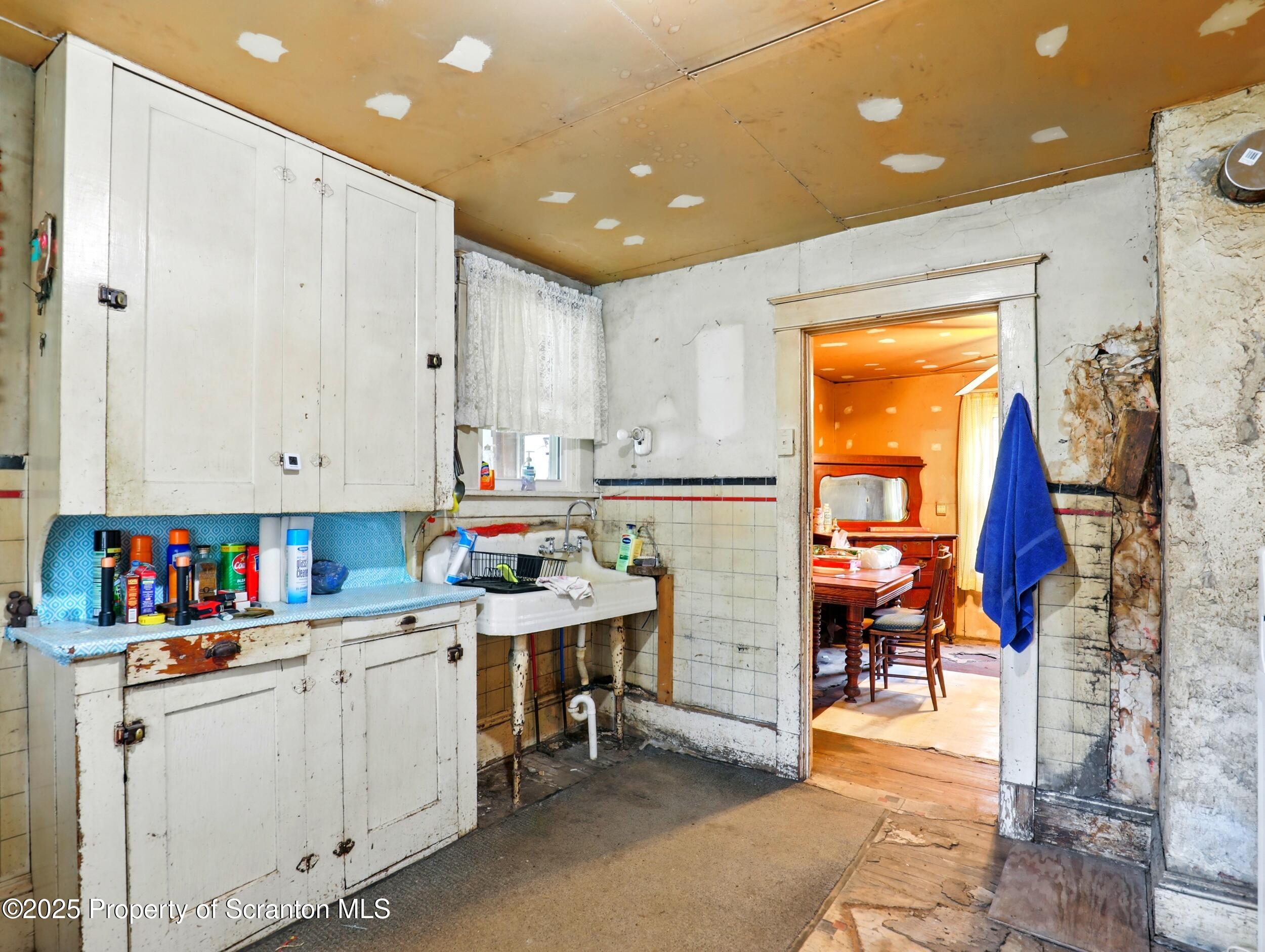 110 Bluegrass Road Tunkhannock, PA 18657 - Photo 7 of 17 a room with stainless steel appliances a sink and a refrigerator