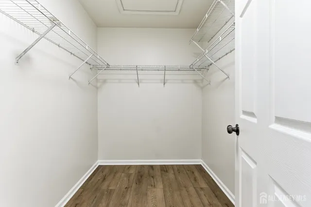 a view of a room with racks on the wall