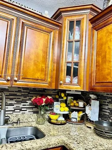 a bedroom with a bed and a mirror