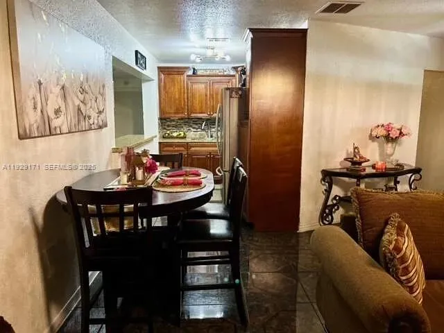 a bedroom with a bed and a mirror