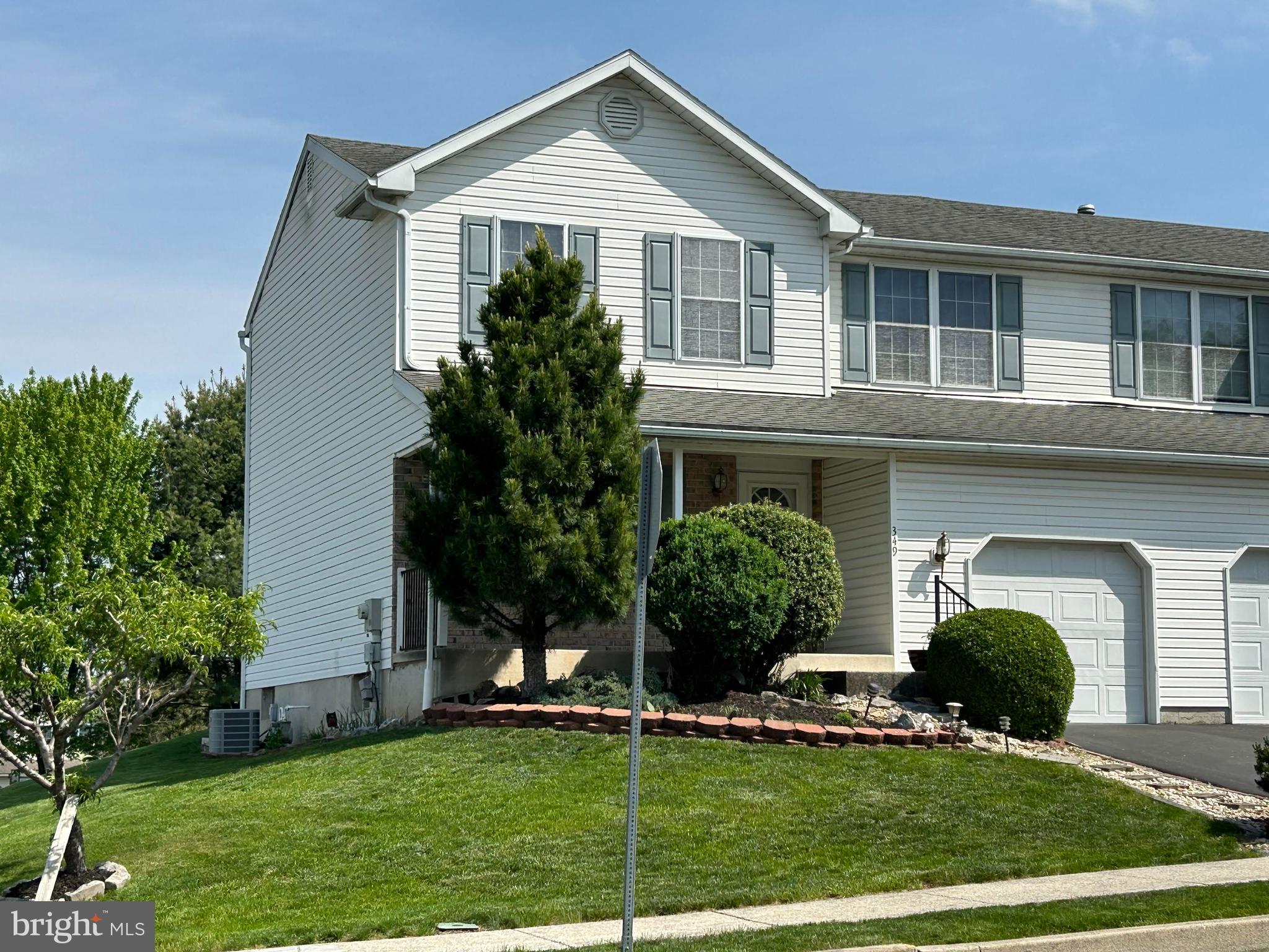 349 Oneida Drive Sinking Spring, PA 19608 - Photo 1 of 35 a front view of a house with a yard