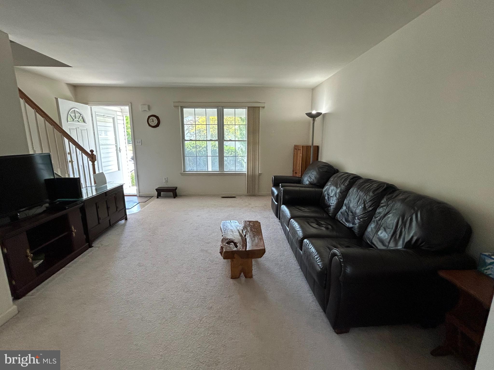349 Oneida Drive Sinking Spring, PA 19608 - Photo 12 of 35 a living room with furniture and a flat screen tv