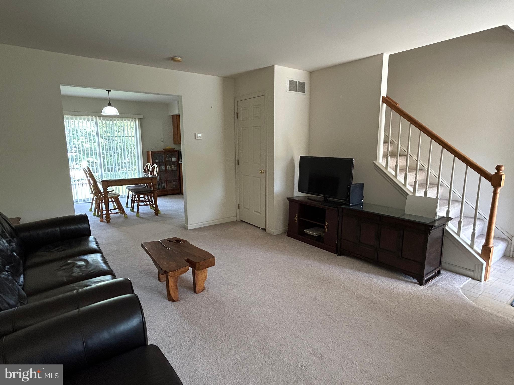 349 Oneida Drive Sinking Spring, PA 19608 - Photo 13 of 35 a living room with furniture and a flat screen tv