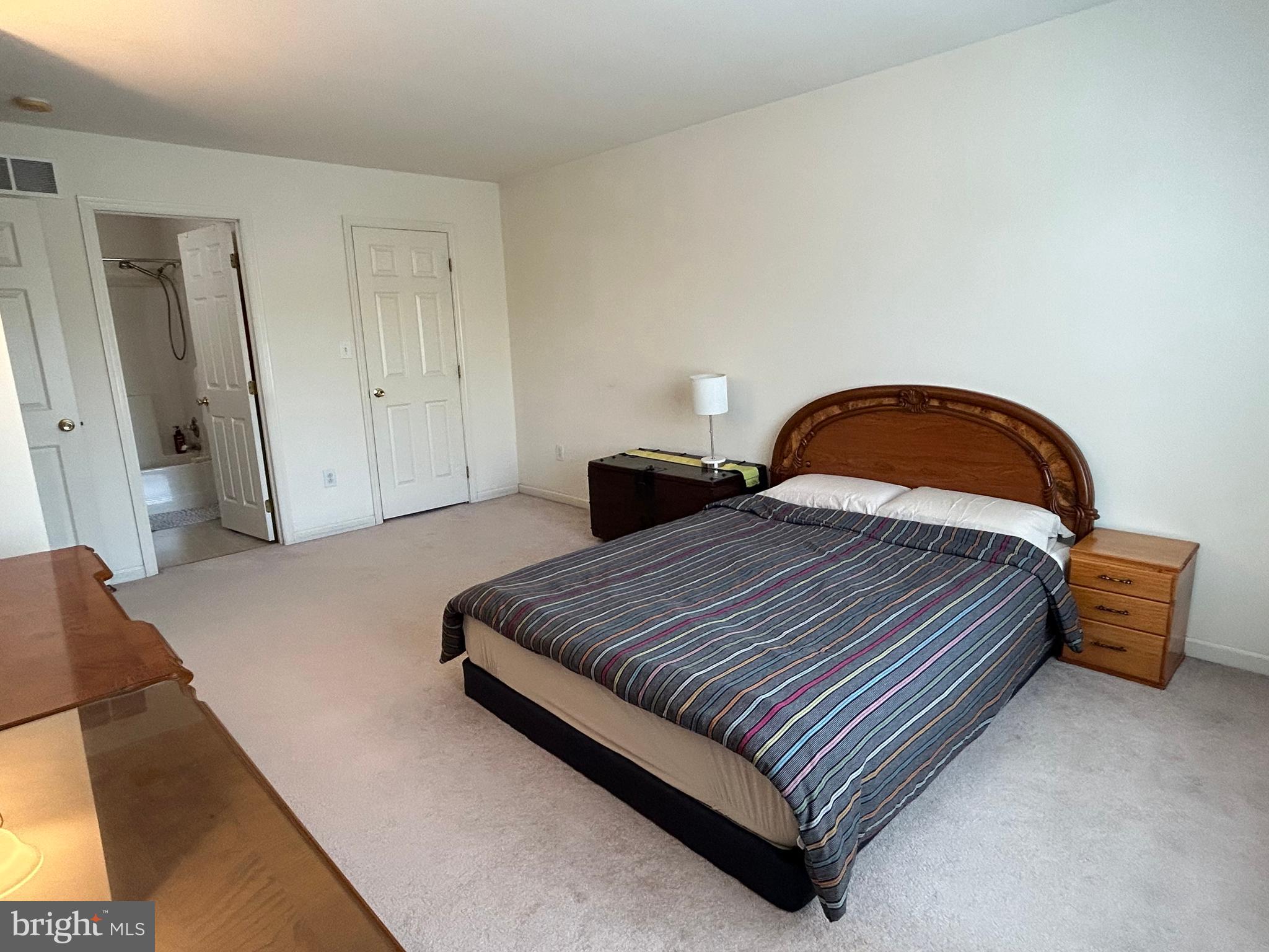 349 Oneida Drive Sinking Spring, PA 19608 - Photo 22 of 35 a bedroom with a bed and wooden floor