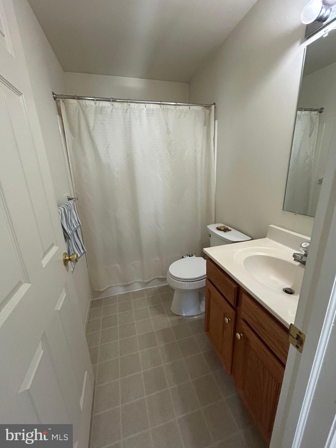349 Oneida Drive Sinking Spring, PA 19608 - Photo 26 of 35 a bathroom with a sink a toilet and shower