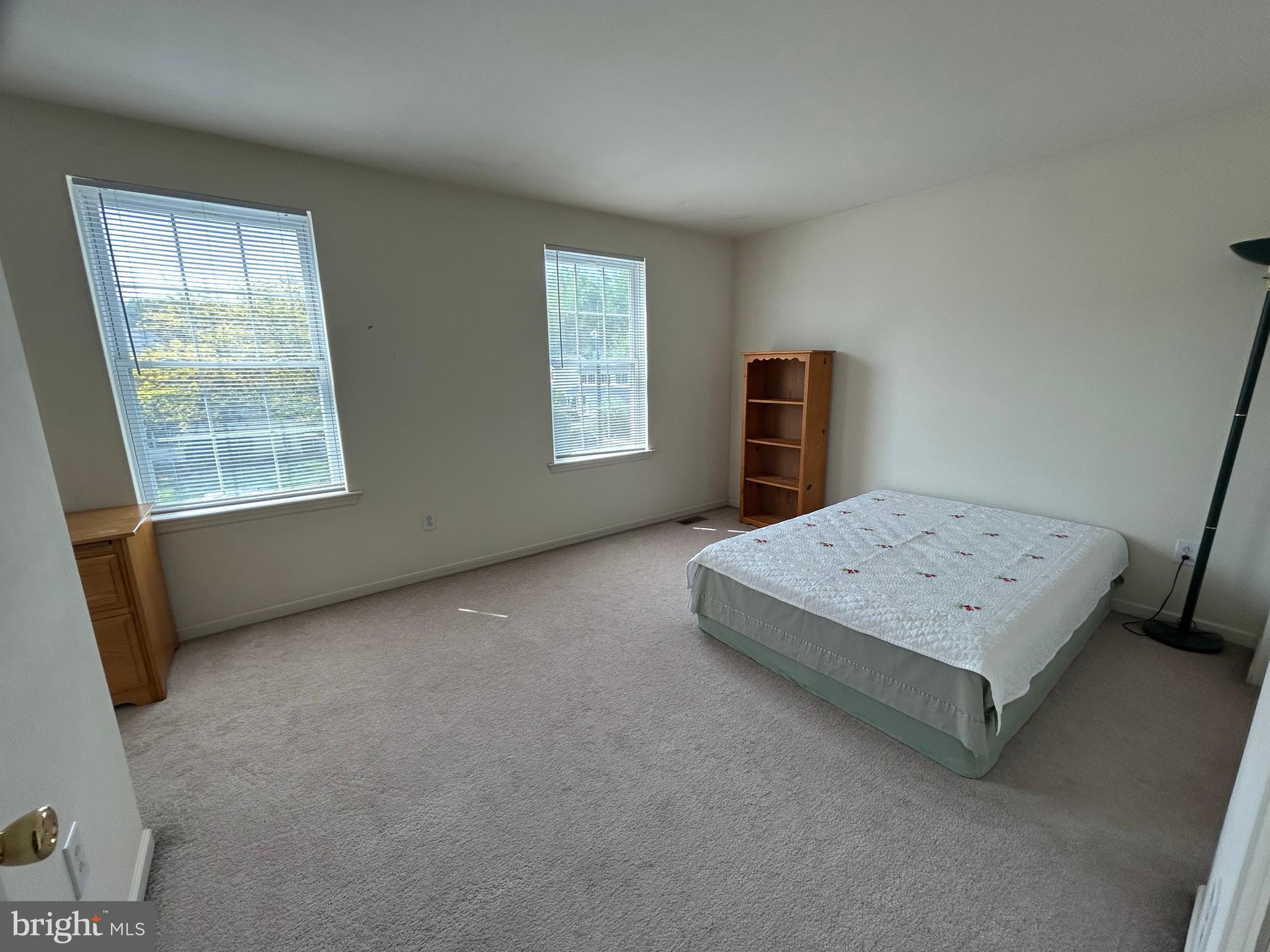 349 Oneida Drive Sinking Spring, PA 19608 - Photo 29 of 35 a view of a bedroom with furniture and window