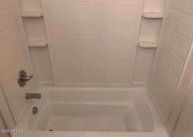 a bathroom with a bathtub