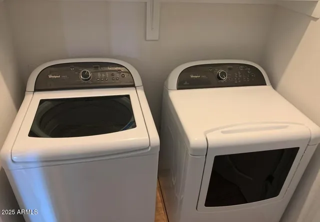 a utility room with dryer and washer