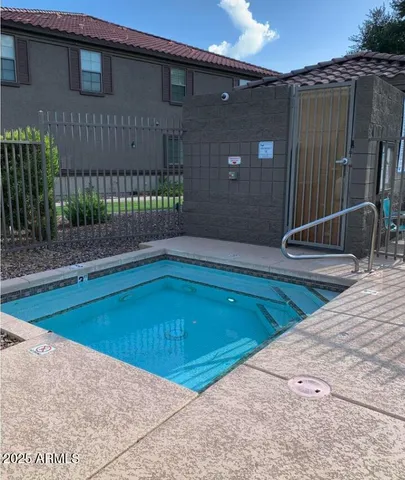a view of backyard and tub