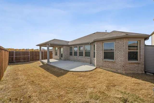 a front view of house with yard