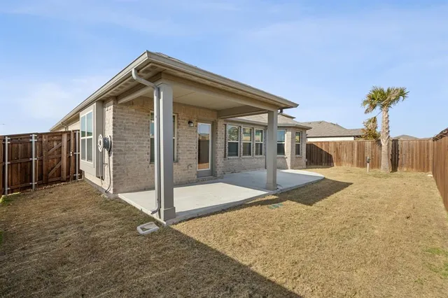 a view of backyard of house
