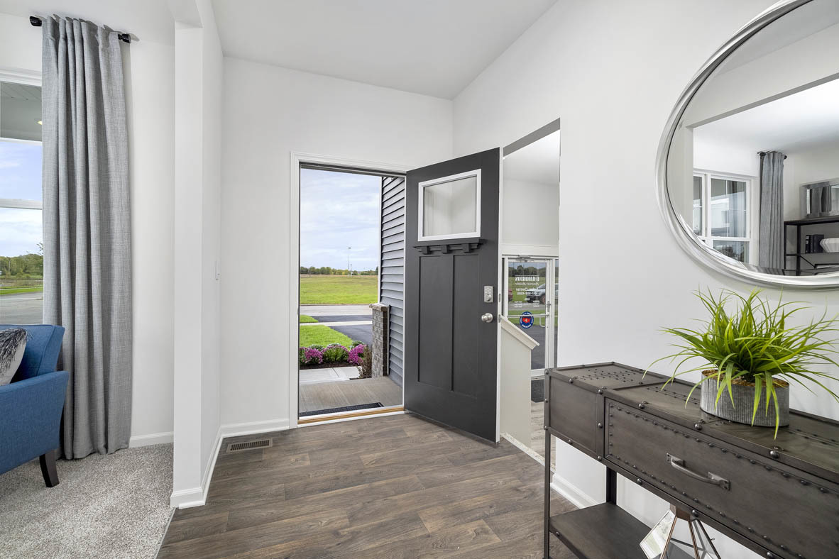 2721 Berrywood Lane Yorkville, IL 60560 - Photo 2 of 38 a view of a livingroom with furniture and a potted plant