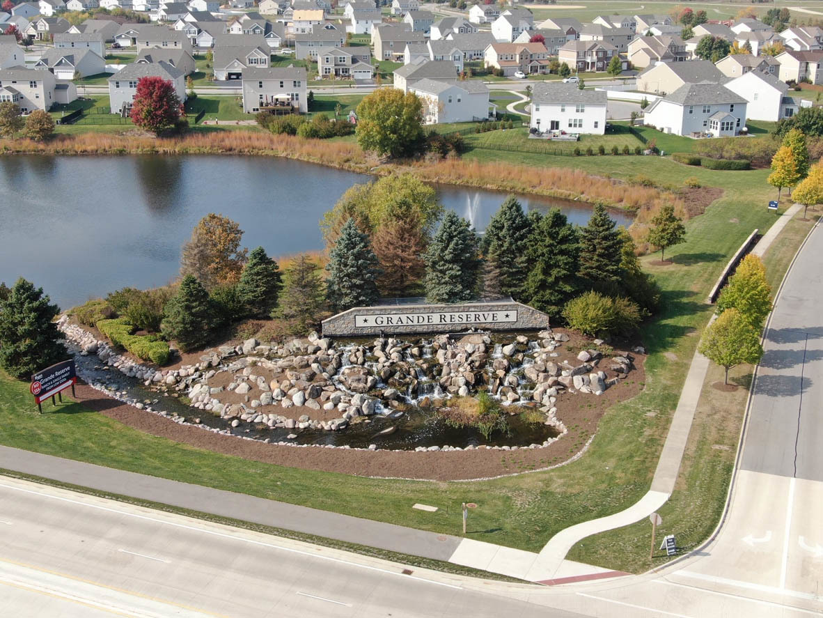 2721 Berrywood Lane Yorkville, IL 60560 - Photo 25 of 38 an aerial view of residential houses with outdoor space and lake view