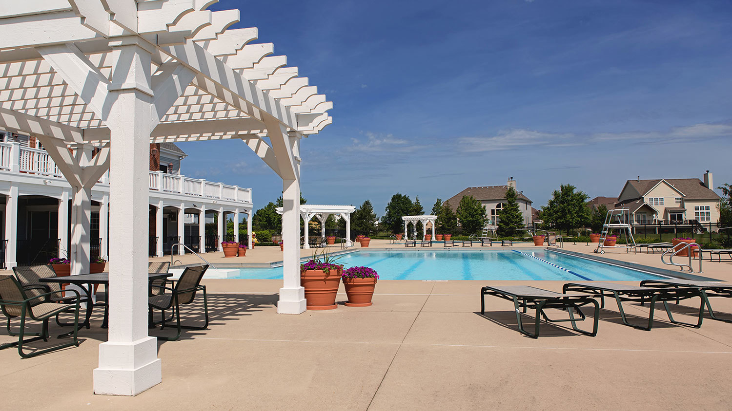 2721 Berrywood Lane Yorkville, IL 60560 - Photo 32 of 38 a view of a swimming pool with outdoor seating