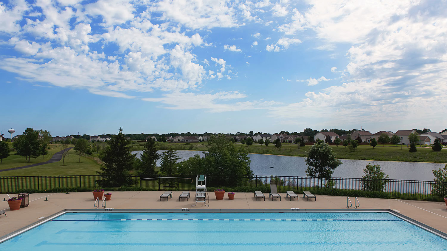 2721 Berrywood Lane Yorkville, IL 60560 - Photo 35 of 38 a view of a lake with houses with outdoor space