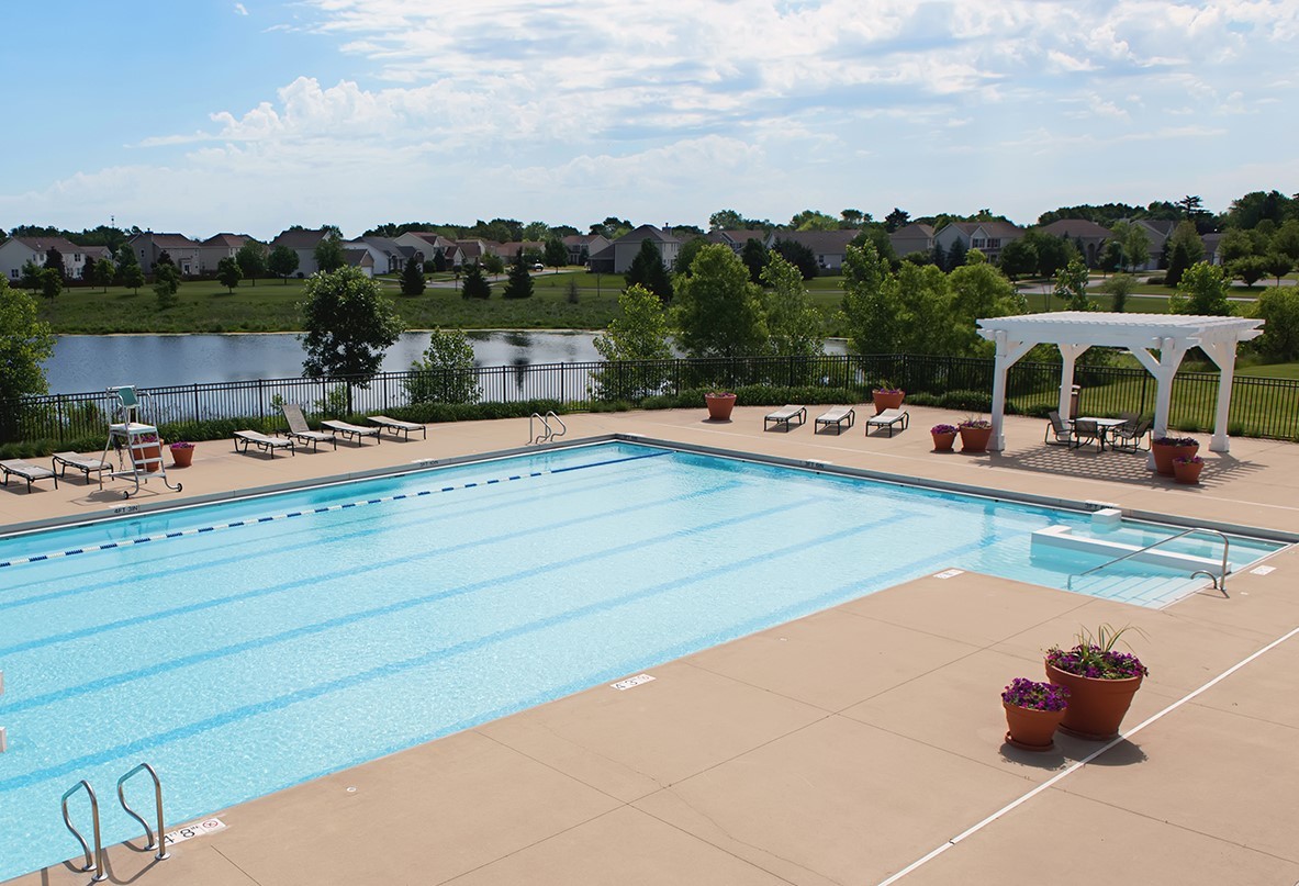 2721 Berrywood Lane Yorkville, IL 60560 - Photo 37 of 38 a view of a swimming pool with lawn chairs
