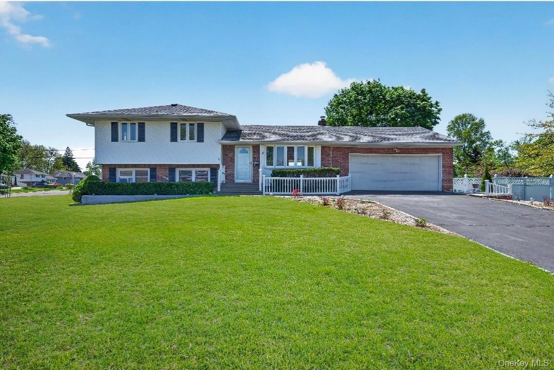 8 White Birch Lane Commack, NY 11725 - Photo 1 of 44 a view of a yard in front of a house