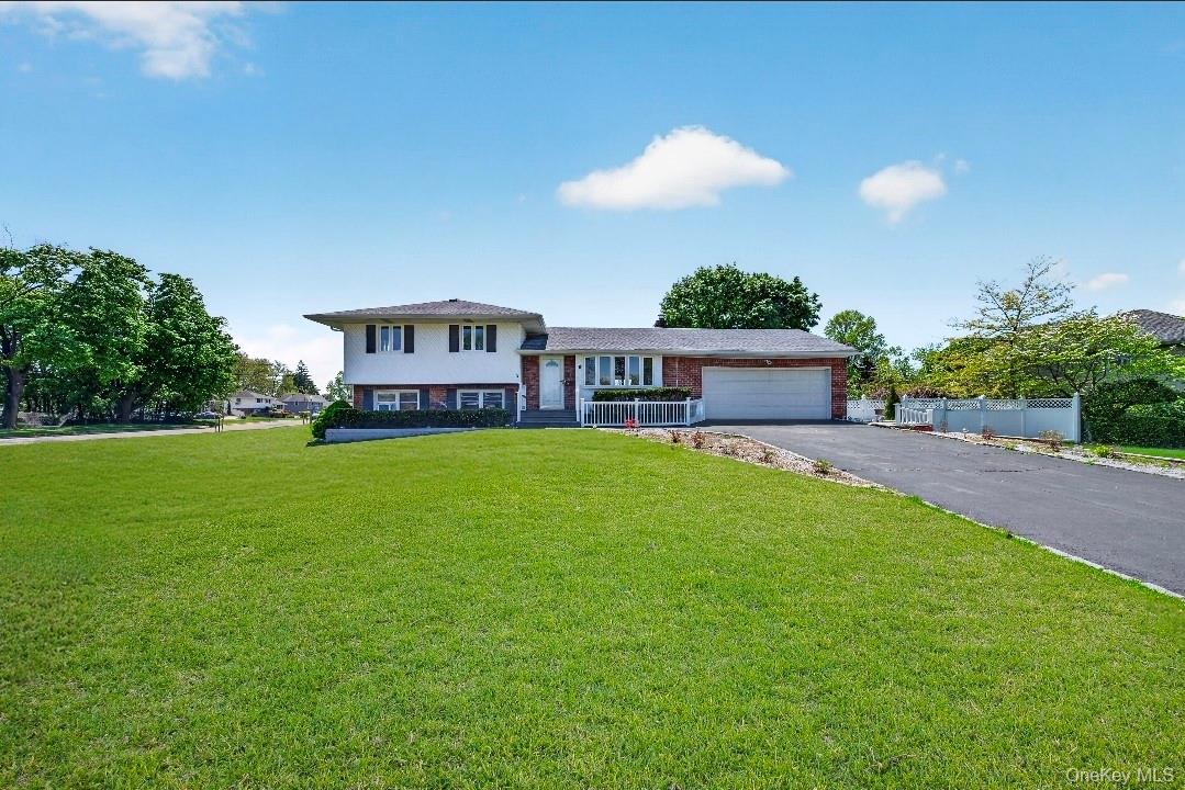8 White Birch Lane Commack, NY 11725 - Photo 2 of 44 a view of house with a backyard