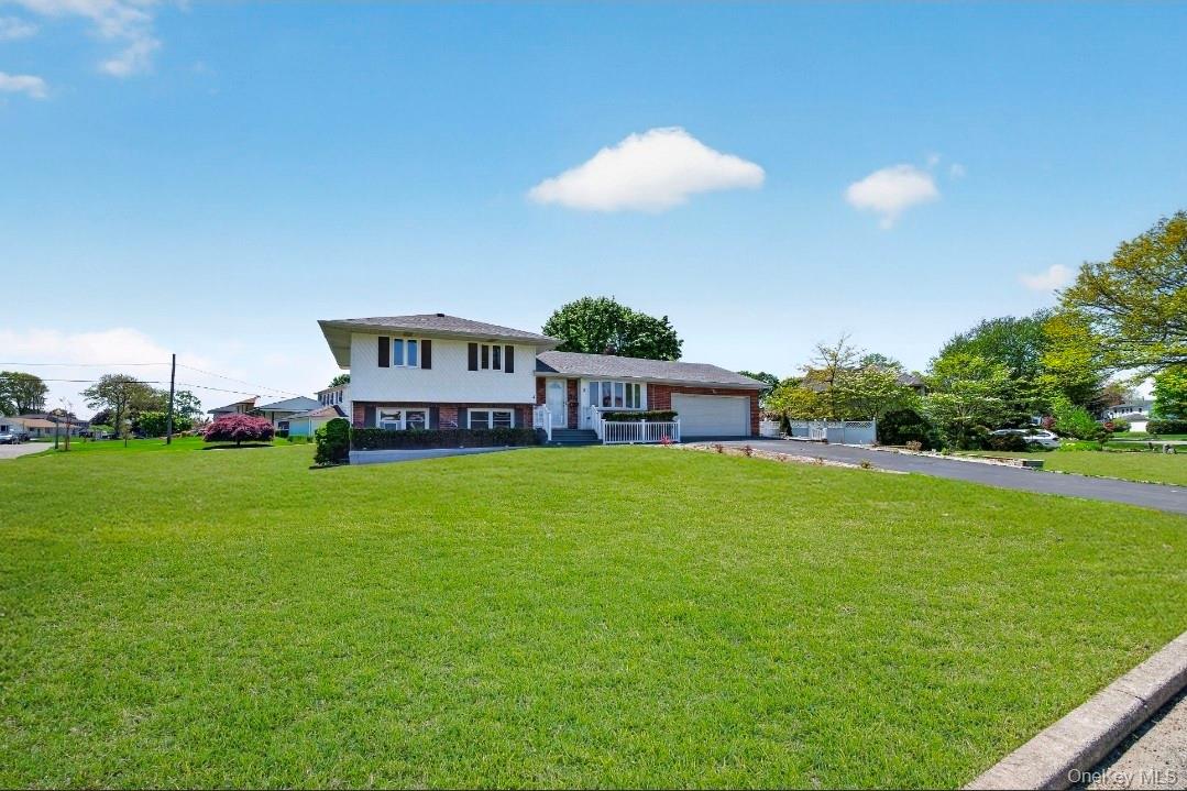 8 White Birch Lane Commack, NY 11725 - Photo 3 of 44 a view of a house with a backyard