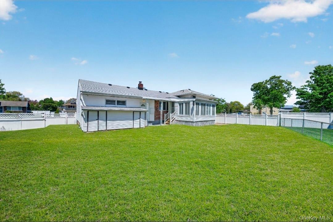 8 White Birch Lane Commack, NY 11725 - Photo 35 of 44 a view of a house with a big yard