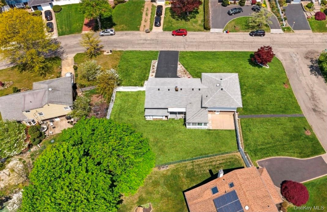 8 White Birch Lane Commack, NY 11725 - Photo 44 of 44 an aerial view of a house with outdoor space