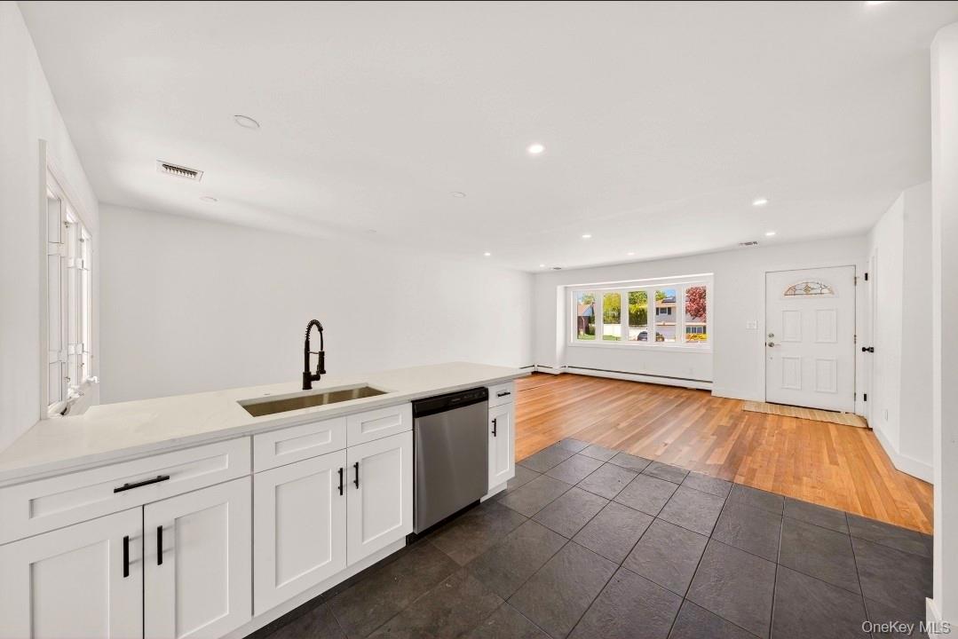 8 White Birch Lane Commack, NY 11725 - Photo 7 of 44 a view of a kitchen with electric appliances