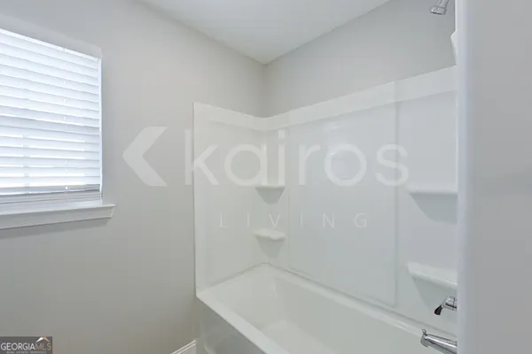 a bathroom with a bathtub